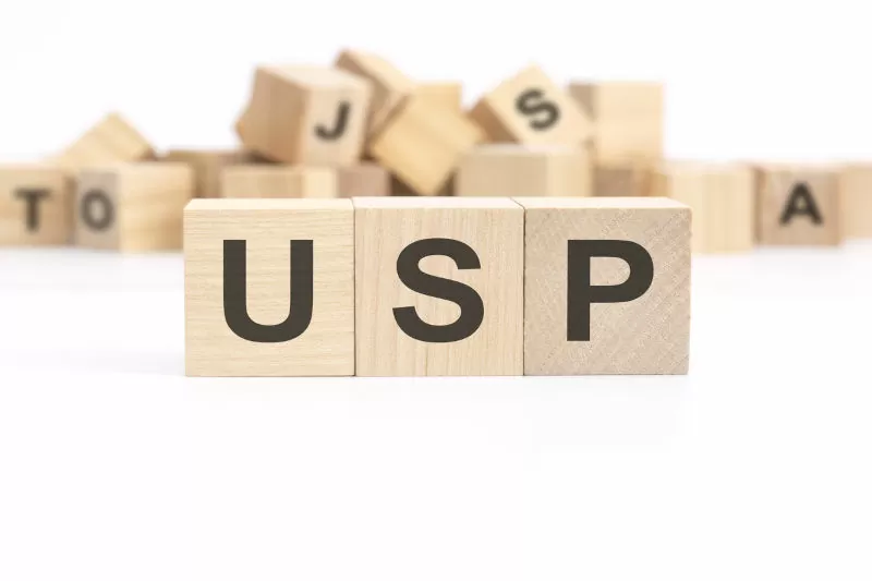 USP on wooden square blocks